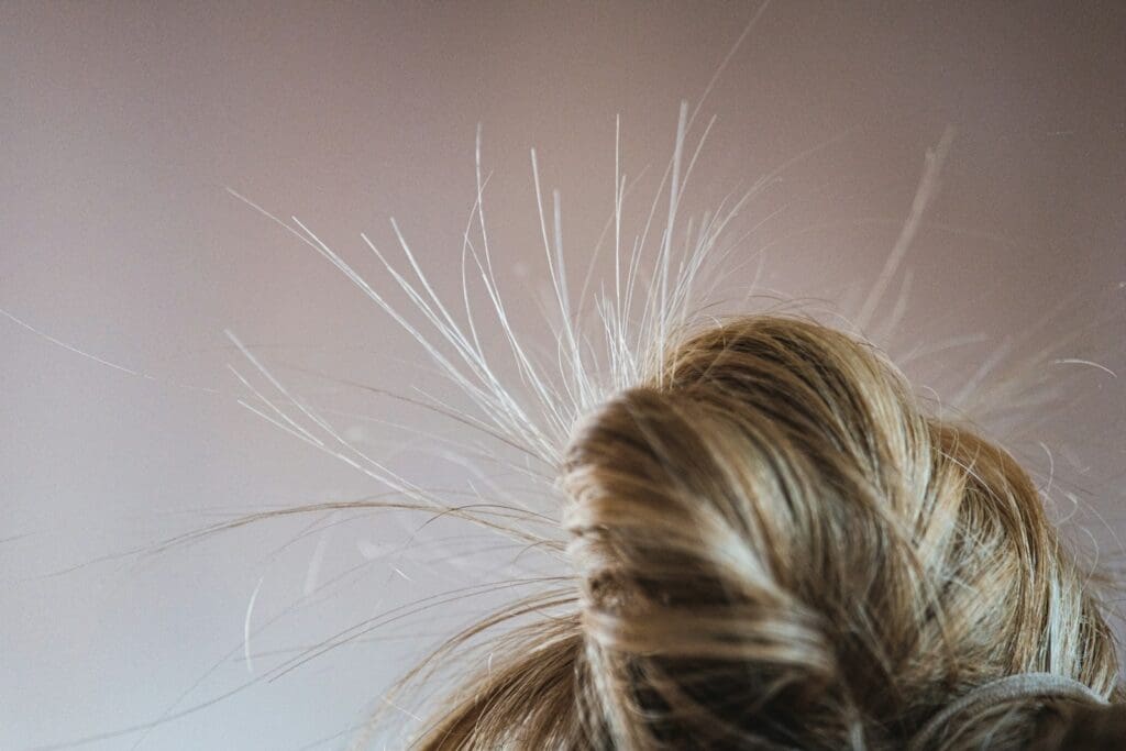 a close up of a woman's hair with long hair
